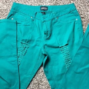 Turquoise never used ripped jeans